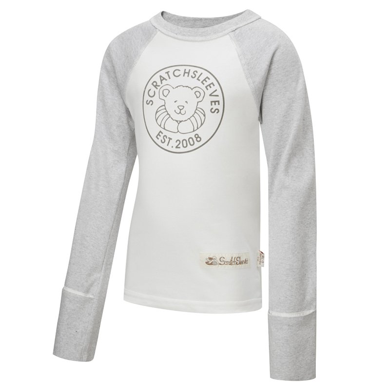 Front view of children's baseball style flip-mitt ScratchSleeves pyjama top with external shoulder, neck and hem seams. White body with grey screen printed logo featuring a bear and est.2008. Grey marl neck and sleeves, with mitts folded back. 100% cotton body and 100% natural silk mitts. External label and branding on the left side towards the base of the top.