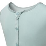 Close up view of the back of ScratchSleeves children's Seafoam dungarees, shows the reinforced opening at the back, from the neck down with green buttons holding it closed. Additional button to the right with loop closure and extra tab which folds over to the neckline with button fastening to keep it secure. Seafoam green sleeveless body in 100% cotton jersey with grey woven cotton trim on the neck.