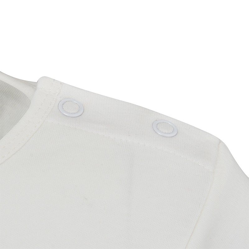 Close up of poppers on neck of ScratchSleeves children's sleepy bear pyjama top. White dye-free 100% cotton jersey pyjama top with white poppers. Shows neck can be made bigger so as not to drag over sore faces and super secure once poppered up.