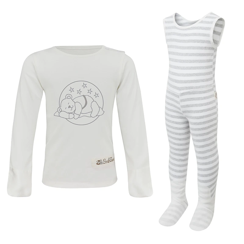 Front view of ScratchSleeves toddlers grey stripe dungarees with no inside leg seam and sewn in feet. Closed feet with a layer of white, 100% woven cotton over the front of the foot and under the toe. grey and white striped, sleeveless body in 100% cotton jersey, edged in white woven cotton trim on the arm and neck. Front view of ScratchSleeves children's grey sleepy bear pyjama top. White dye-free pyjama top with popper neck opening on the right, white sewn in mitts and grey sleeping bear print. 100% cotton jersey body with 100% natural silk mitts. External label and branding on the left side towards the base of the top.